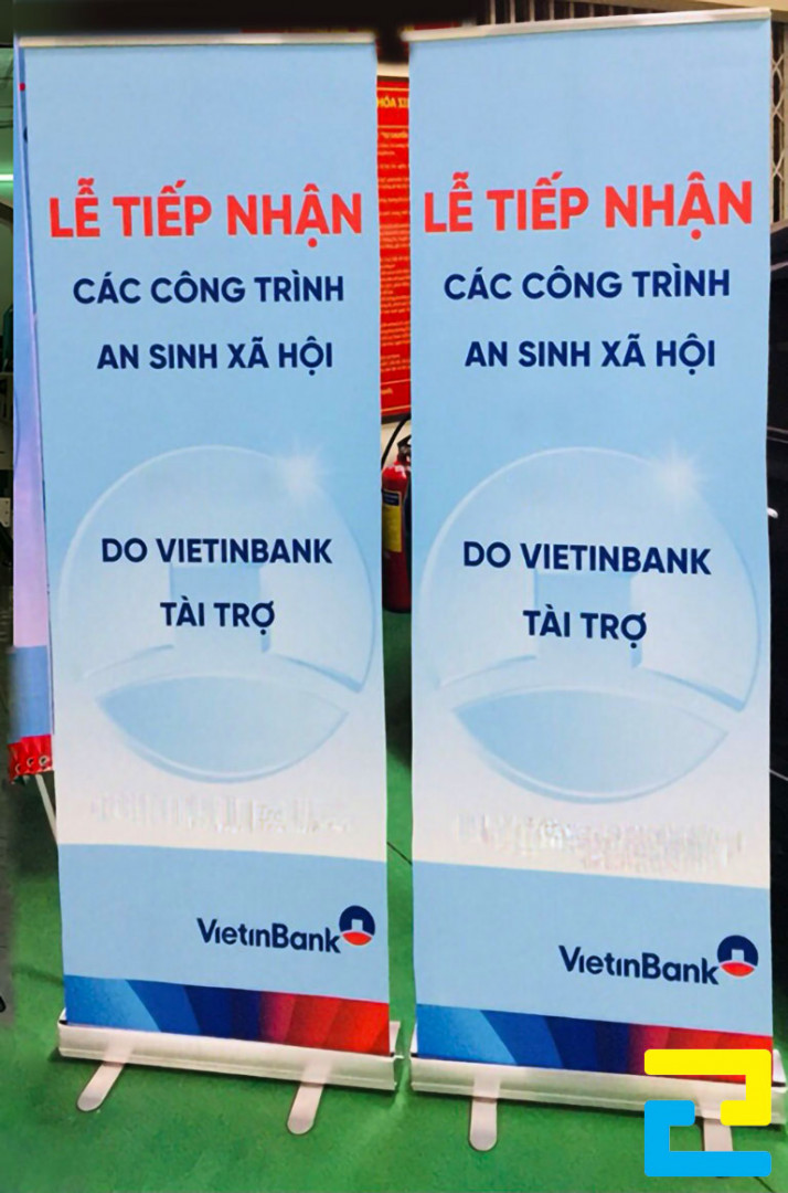 In standee lễ tiếp nhận các công trình an sinh xã hội