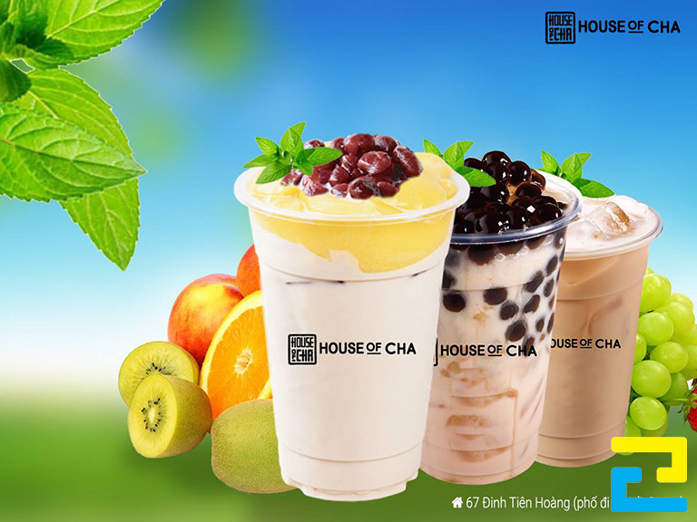 Mẫu 11: Bandroll khai trương quán trà sữa được thiết kế với tông màu xanh dương - xanh lá cây, có hình ảnh ly trà sữa - trái cây đẹp mắt