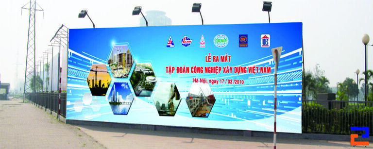 Mẫu in bạt quảng cáo kết hợp hệ thống đèn chiếu bên ngoài thông báo lễ khai trương của doanh nghiệp